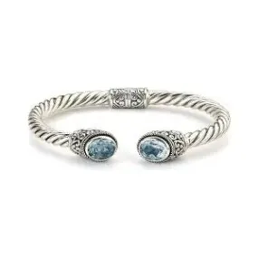 SS OVAL BLUE TOPAZ TWISTED BANGLE